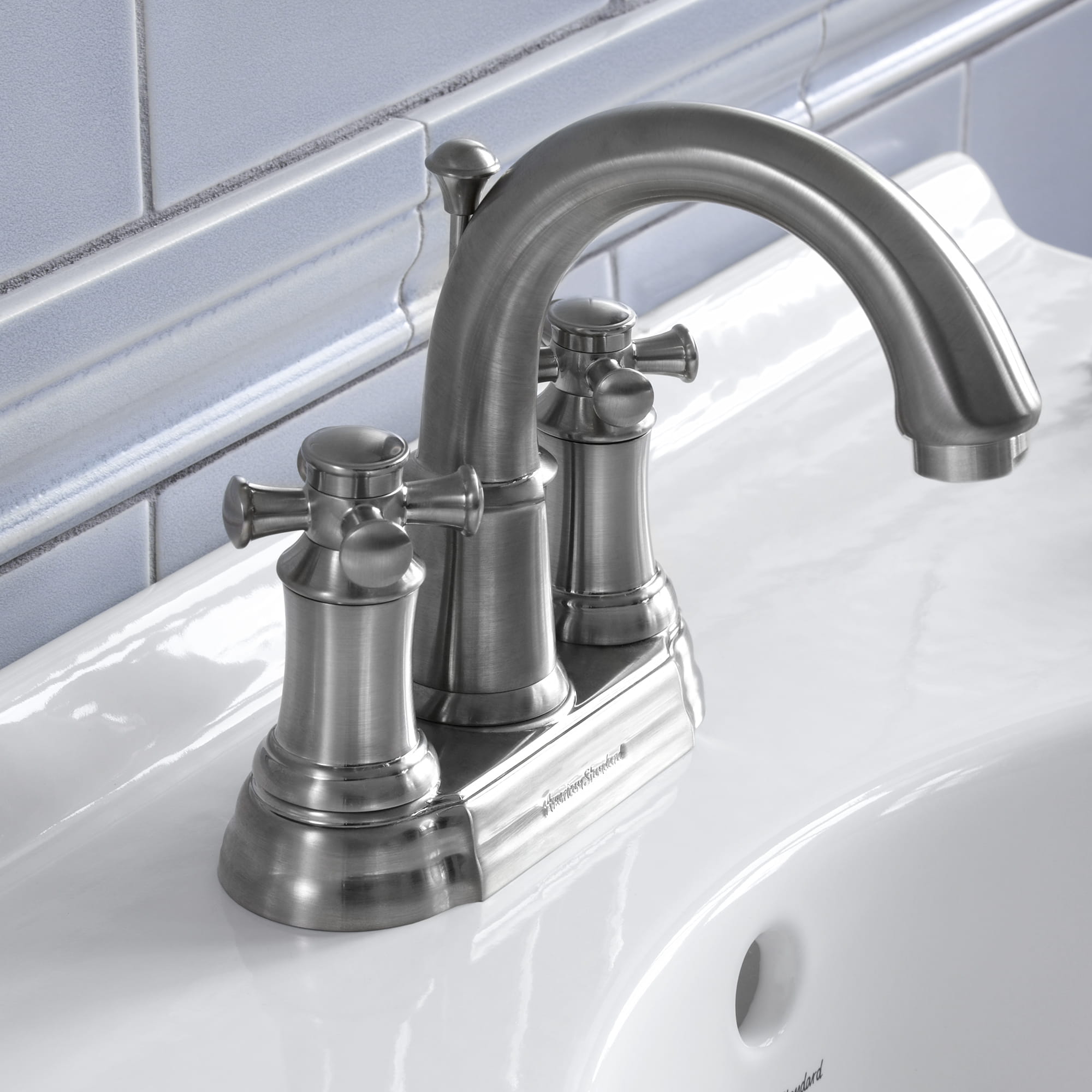 Portsmouth 4 In Centerset 2 Handle Crescent Spout Bathroom Faucet 12 GPM with Cross Handles   BRUSHED NICKEL